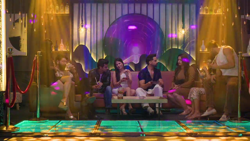 Bhavya and Rishank at the club, surrounded by friends