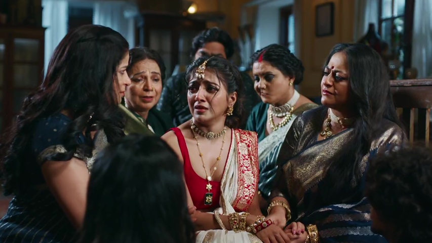 Gauri looking determined while talking to her family, with Sarda and Arjun by her side
