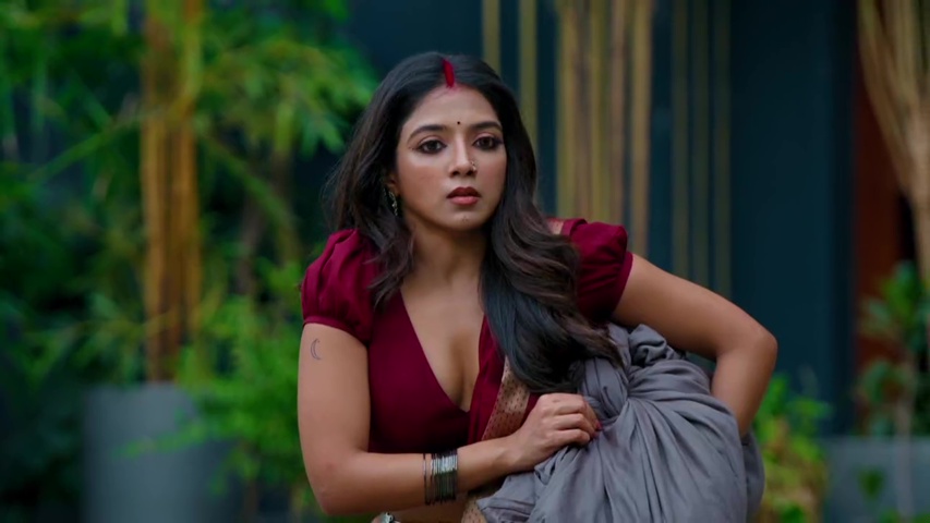 Gauri walking confidently with clothes, ready to face Vihaan