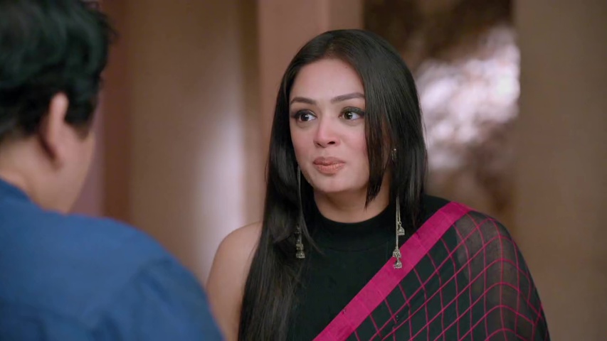 Gayatri crying as she defends herself, with Jagdish and Om arguing in the background