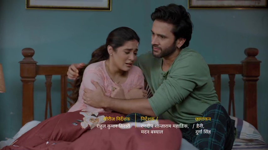 Isha crying in Om’s arms