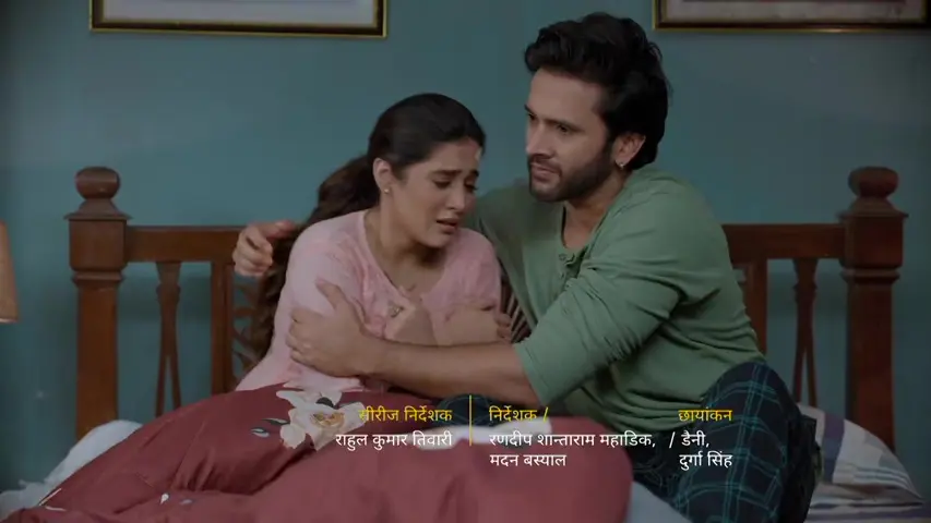 Isha crying in Om’s arms
