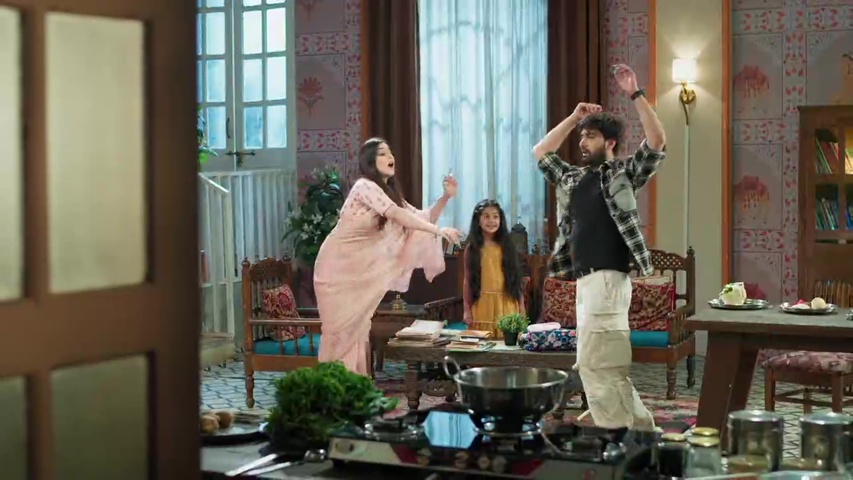 Maira and Arman in a playful dance practice moment