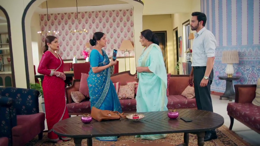 Mangal showing the photo evidence to Sowmya and Kusum