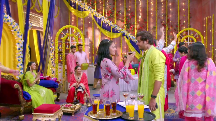 Megha handing the spiked juice to Kabir during the mehendi ceremony