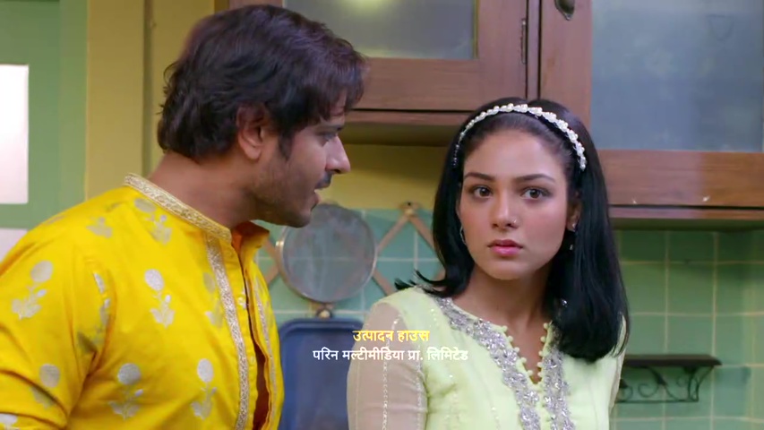 Megha looking shocked as she drops the glass