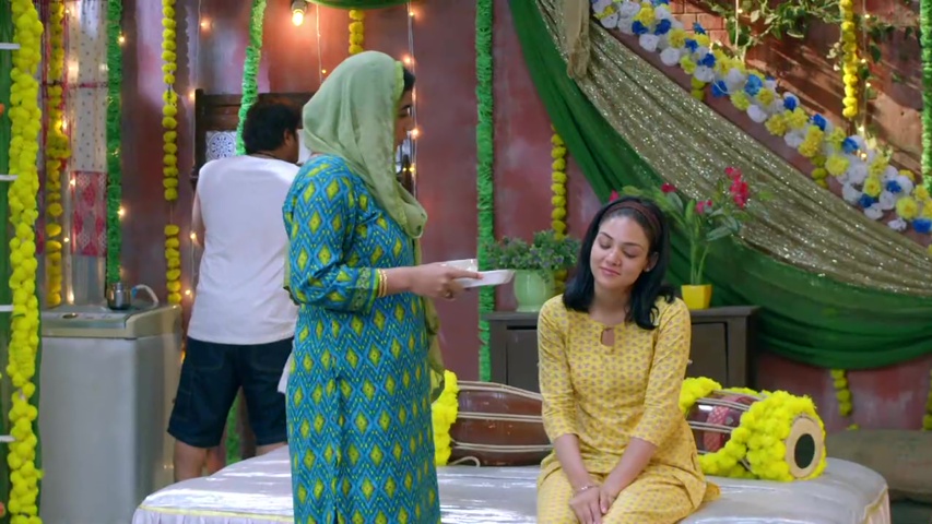 Megha smiling and talking to Heer in the morning