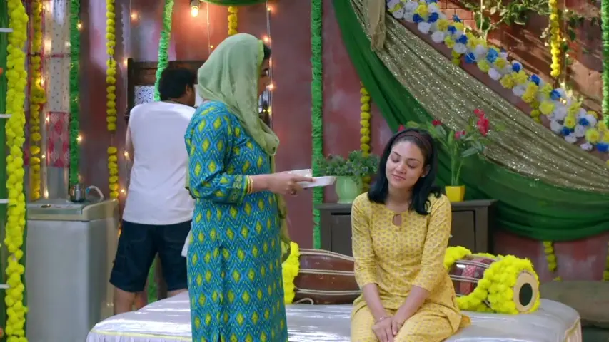 Megha smiling and talking to Heer in the morning
