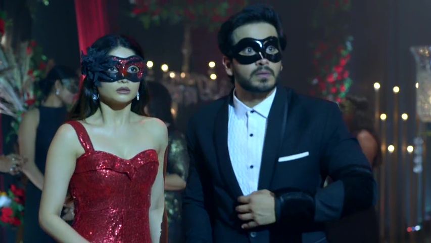 Neil and Saavi dancing at the event, masks on