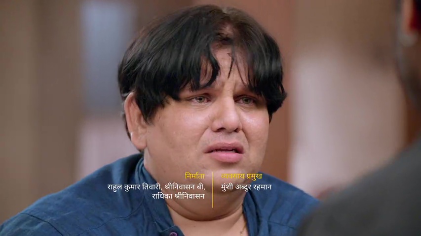 Om confronts Amitabh in the living room of Ram Bhavan