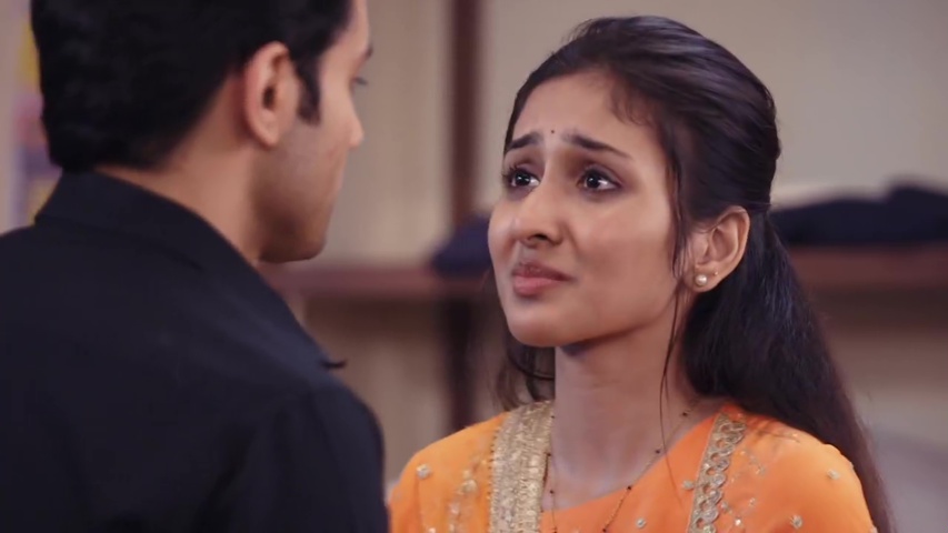 Parineet holding Sanju’s hand, looking worried as they talk about Preeth