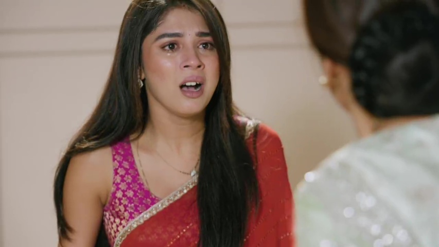 Rahi pleading with Khyati, who turns away in anger