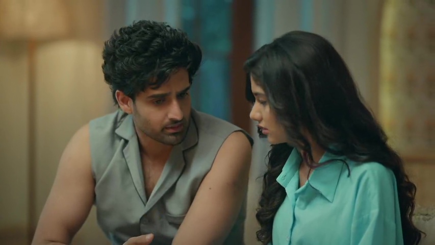 Rani and Digvijay sitting together at night, with Digvijay reassuring her as she holds the bail papers