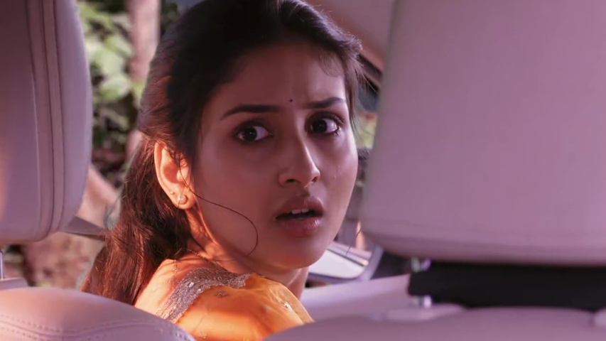 Sanju and Parineet in the car, looking tense as goons chase them