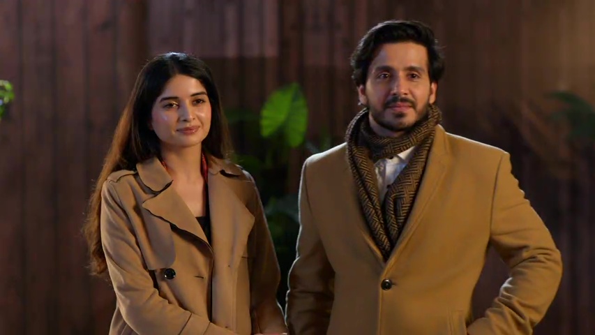 Savi and Neil talking to the police, pretending to be a couple to avoid trouble