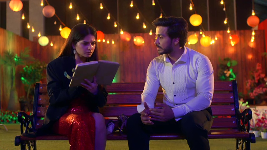 Savi holding Rajat’s diary, looking shocked as she reads it