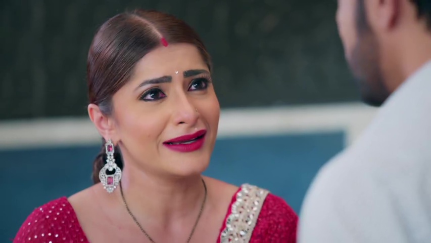 Sowmya crying as she talks to Adit about feeling left out in the family