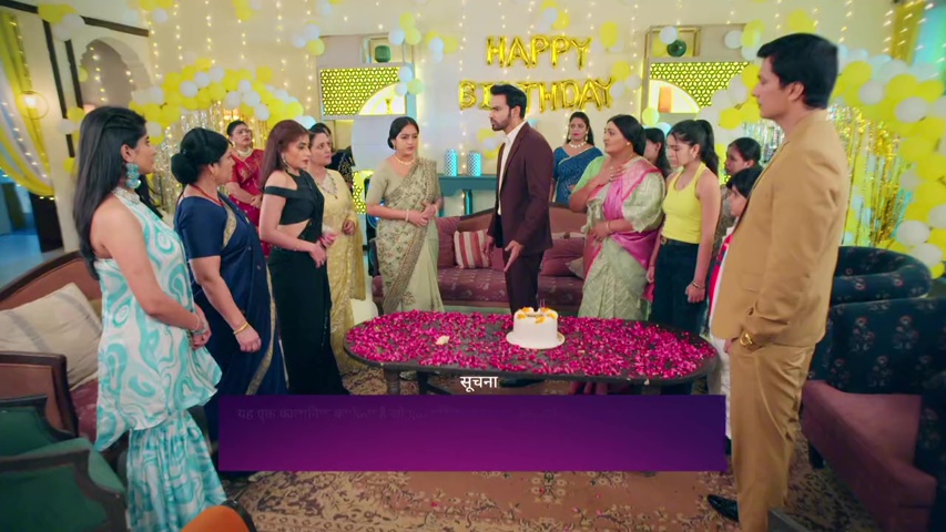 Sowmya looking apologetic as Adit scolds her, with the egg cake on the table