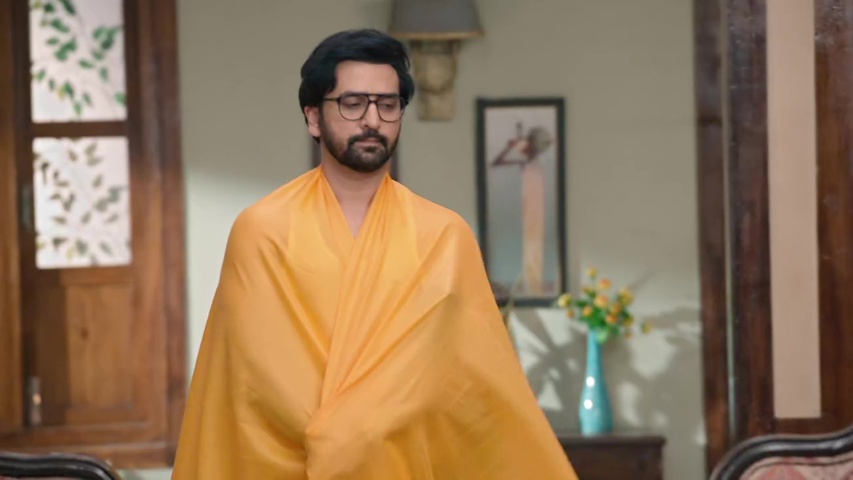 Tejas in his odd-colored clothes, looking frustrated as Sachin teases him