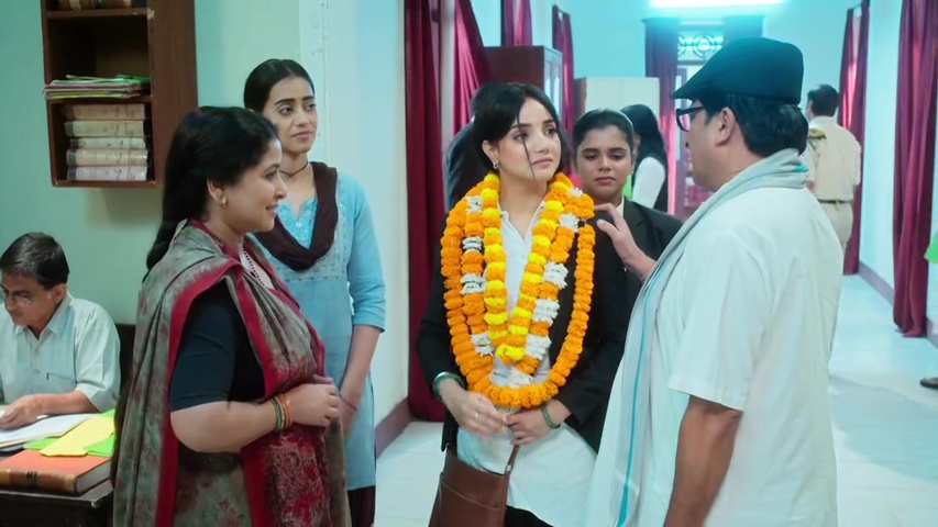 celebrating Anjali’s victory outside the court