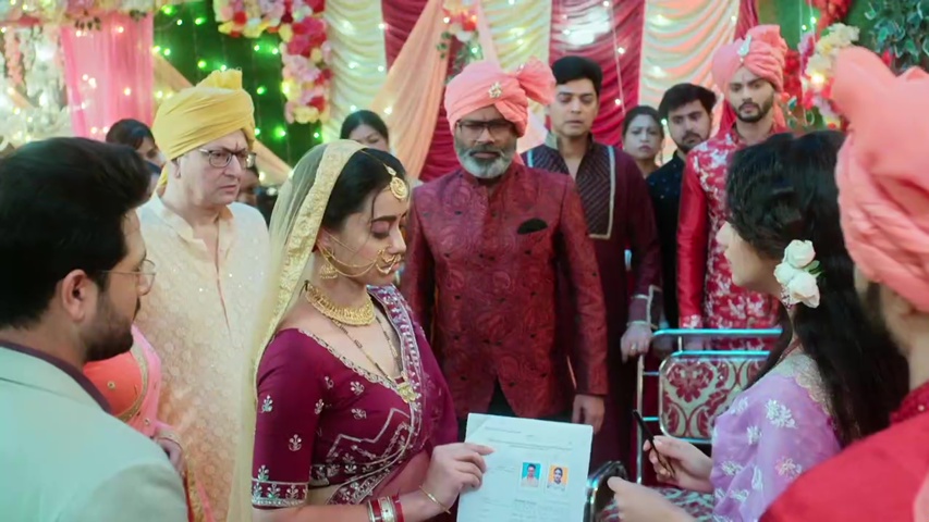 tense moment with Padma holding the wedding papers, surrounded by the Rajput family